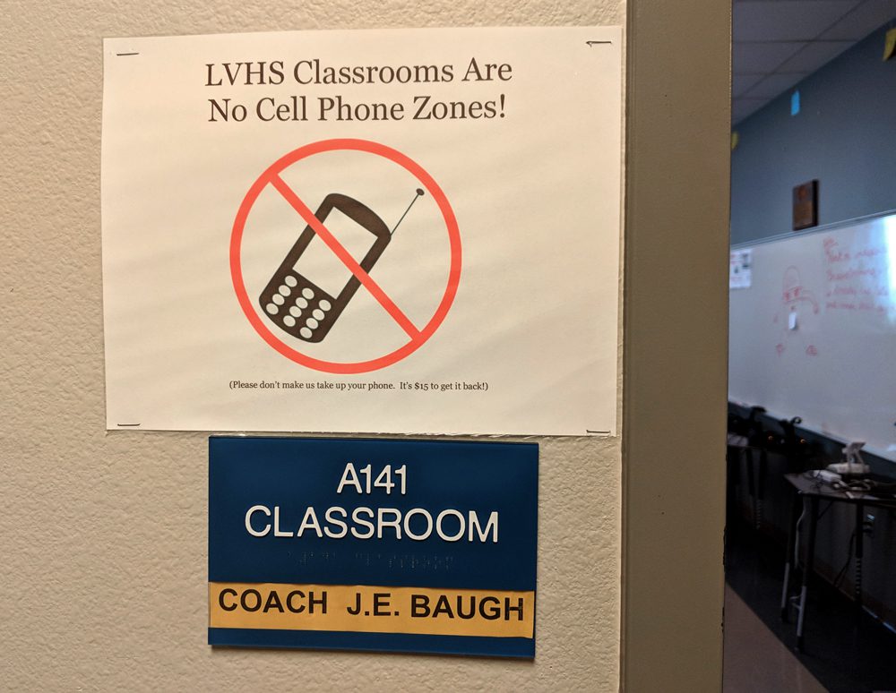 A no-cell phone warning sign outside a Lago Vista High School classroom